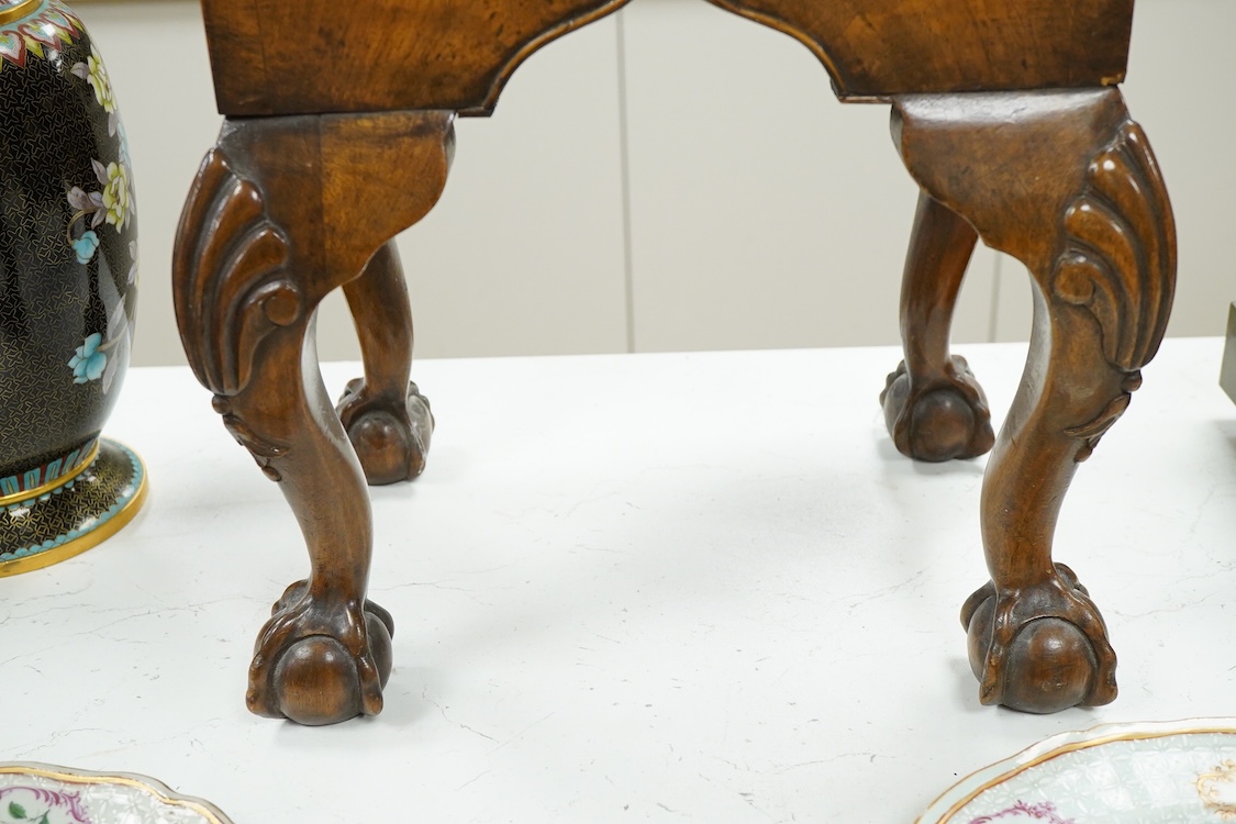 An early 20th century miniature walnut four drawer chest, 67cm